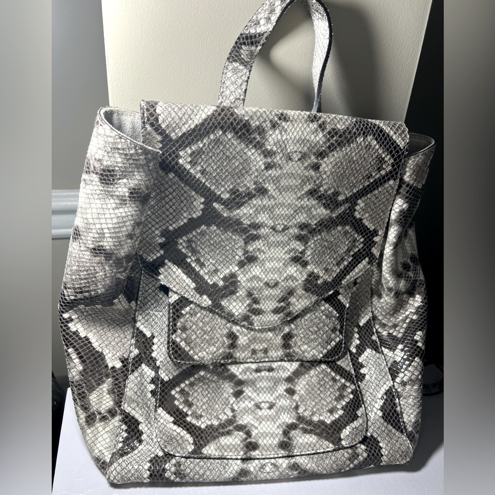 Snake print leather bag pack